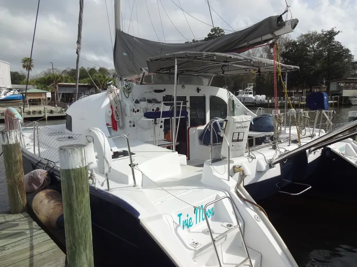 Cajun Moon Yacht Photos Pics 2003 Lagoon 410 catamaran docked at marina.