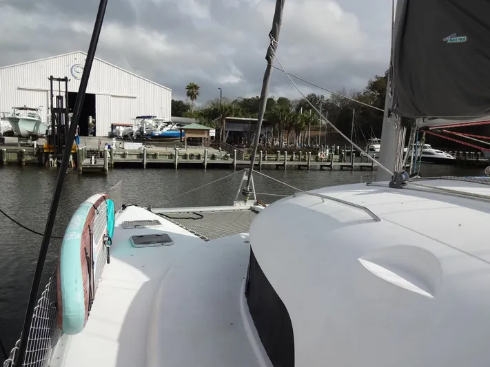 Cajun Moon Yacht Photos Pics 2003 Lagoon 410 catamaran docked at marina.