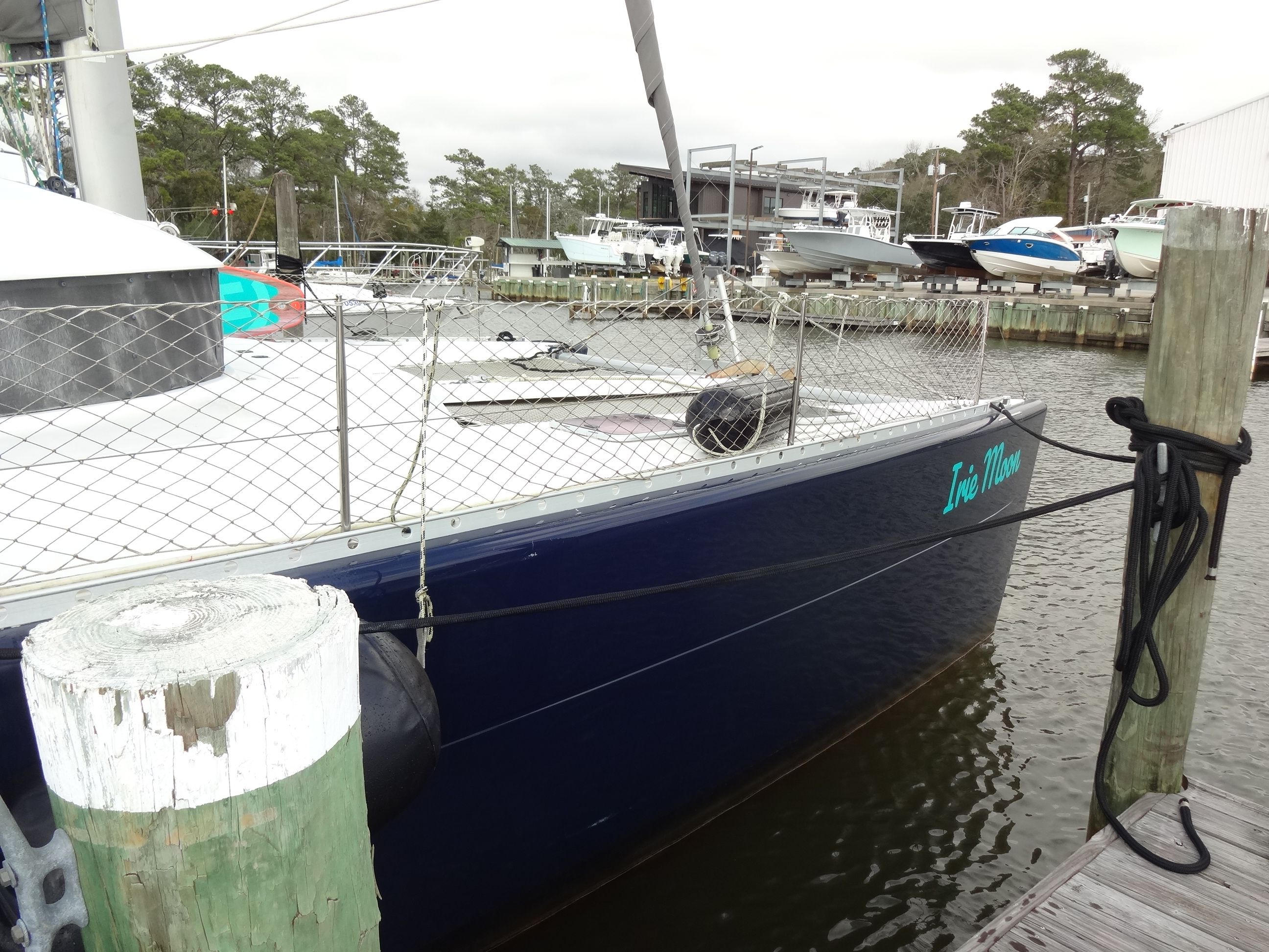 2003 Lagoon 410 catamaran docked at marina.