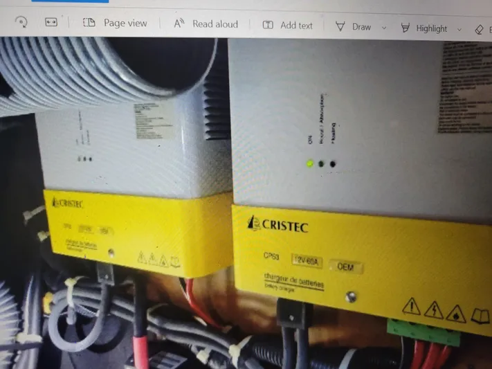 Bear, De Yacht Photos Pics Cristec battery chargers in a 2011 Lagoon 450 yacht, featuring yellow casings and wiring.