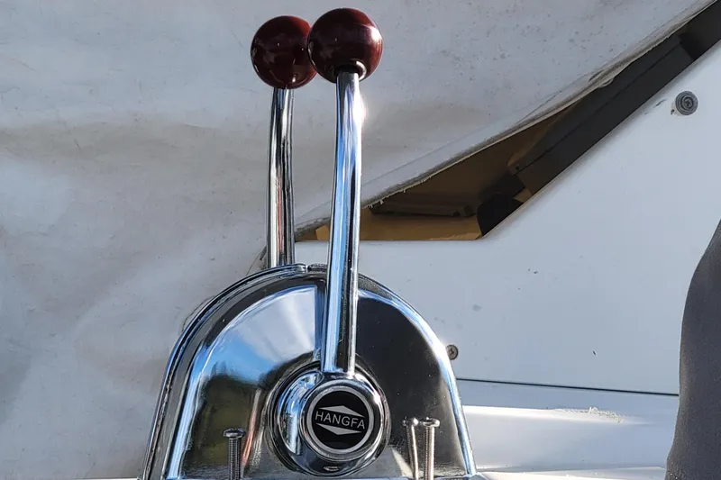 Bear, De Yacht Photos Pics Chrome throttle controls on a 2011 Lagoon 450 catamaran.