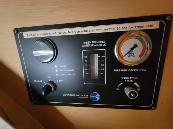 Bear, De Yacht Photos Pics Control panel of a 2011 Lagoon 450 water maker system, showing pressure and water quality indicators.