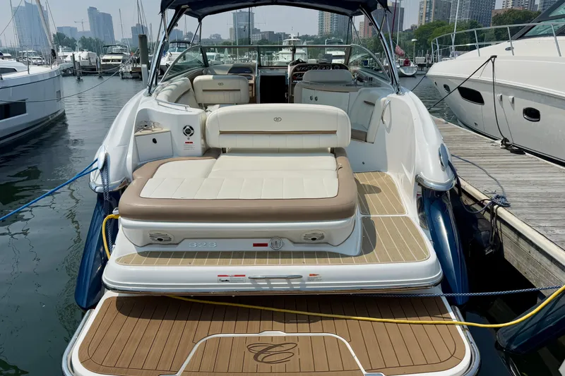  Yacht Photos Pics Luxury 2012 Cobalt 323 boat docked at marina, featuring spacious seating and elegant design.