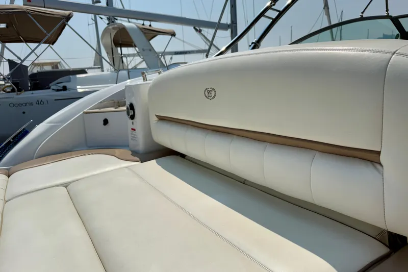  Yacht Photos Pics Luxurious seating on a 2012 Cobalt 323 boat, featuring elegant white upholstery.