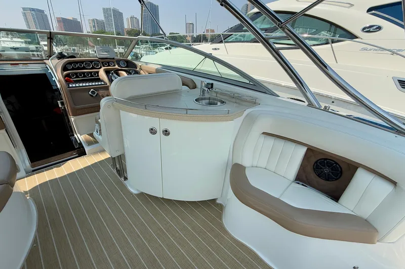  Yacht Photos Pics Luxurious 2012 Cobalt 323 boat interior with plush seating and modern dashboard.