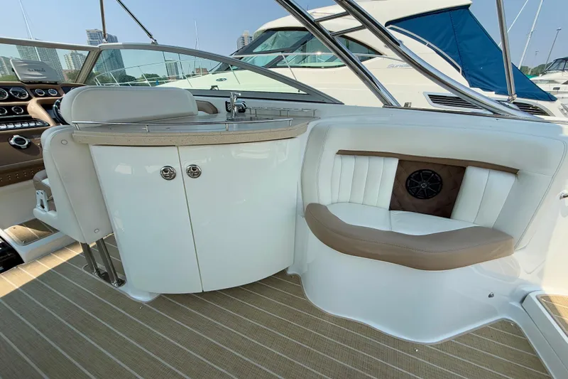  Yacht Photos Pics Luxurious interior of a 2012 Cobalt 323 boat with seating and control panel.