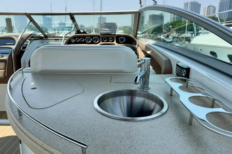  Yacht Photos Pics Luxury Cobalt 323 boat interior with sink and cup holders, 2012 model.
