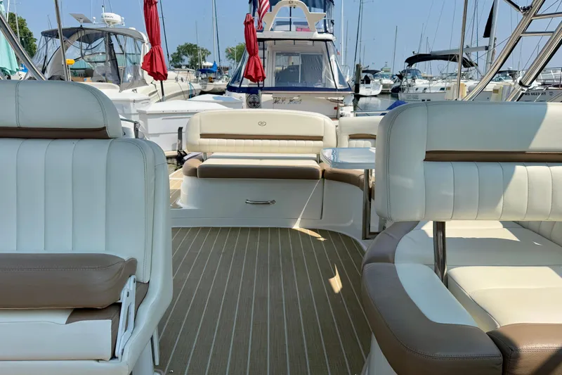  Yacht Photos Pics Luxurious interior of a 2012 Cobalt 323 boat with plush seating and elegant design.