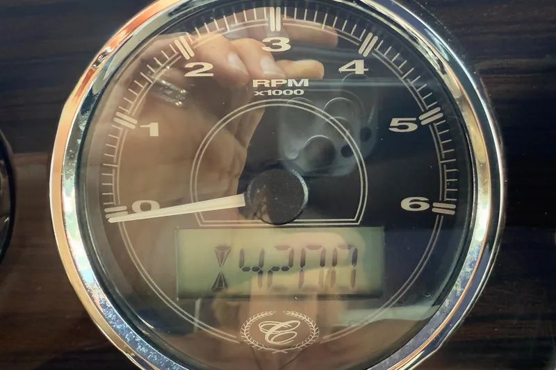  Yacht Photos Pics Tachometer of 2012 Cobalt 323 showing 427 hours, RPM x1000 gauge.