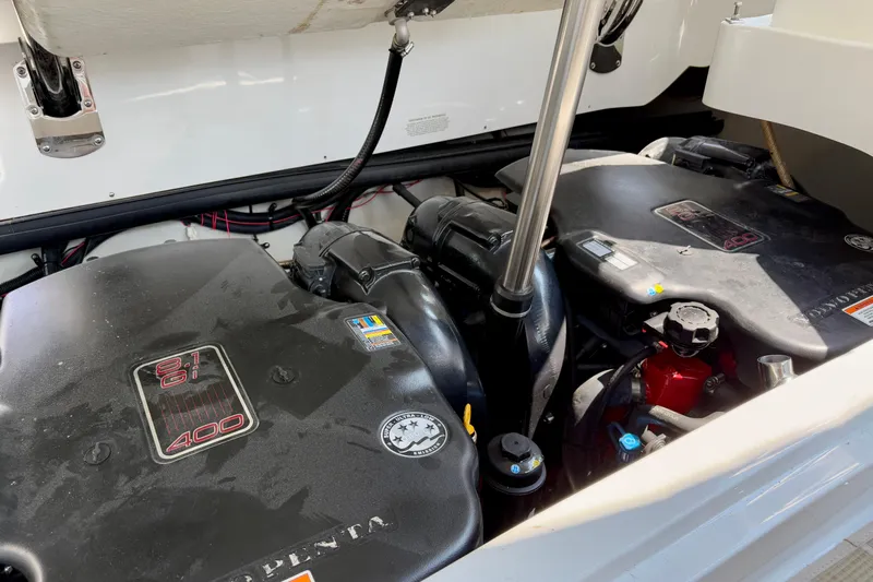  Yacht Photos Pics Engine compartment of a 2012 Cobalt 323 boat featuring dual Volvo Penta 8.1 Gi engines.