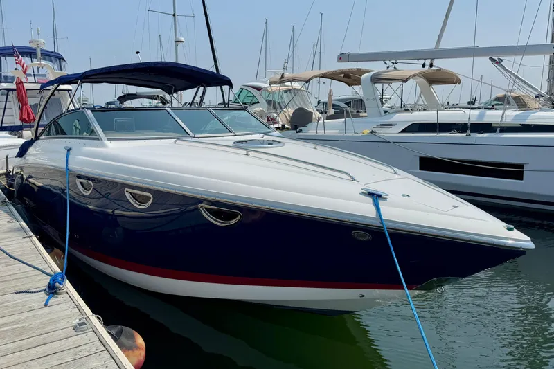  Yacht Photos Pics Luxury 2012 Cobalt 323 boat docked in marina, featuring sleek design and modern amenities.