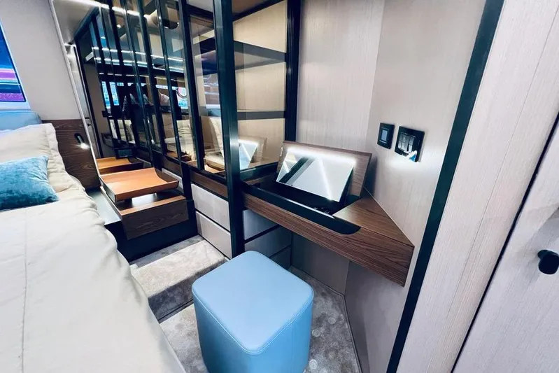  Yacht Photos Pics Luxurious interior of 2023 Azimut S7 yacht with modern vanity and seating.