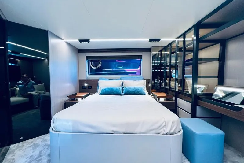  Yacht Photos Pics Luxurious bedroom interior of 2023 Azimut S7 yacht with modern design and elegant furnishings.