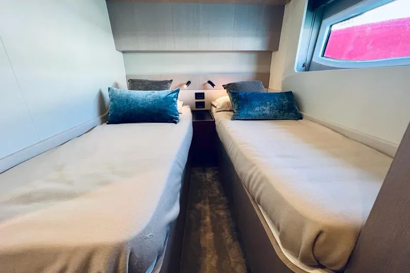  Yacht Photos Pics 2023 Azimut S7 yacht cabin with twin beds and modern decor.