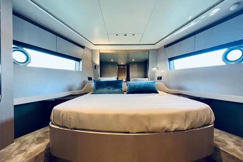  Yacht Photos Pics Luxurious 2023 Azimut S7 yacht bedroom with modern design and elegant decor.
