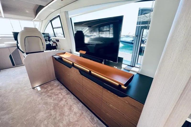  Yacht Photos Pics Luxurious interior of 2023 Azimut S7 yacht with modern furnishings and large windows.