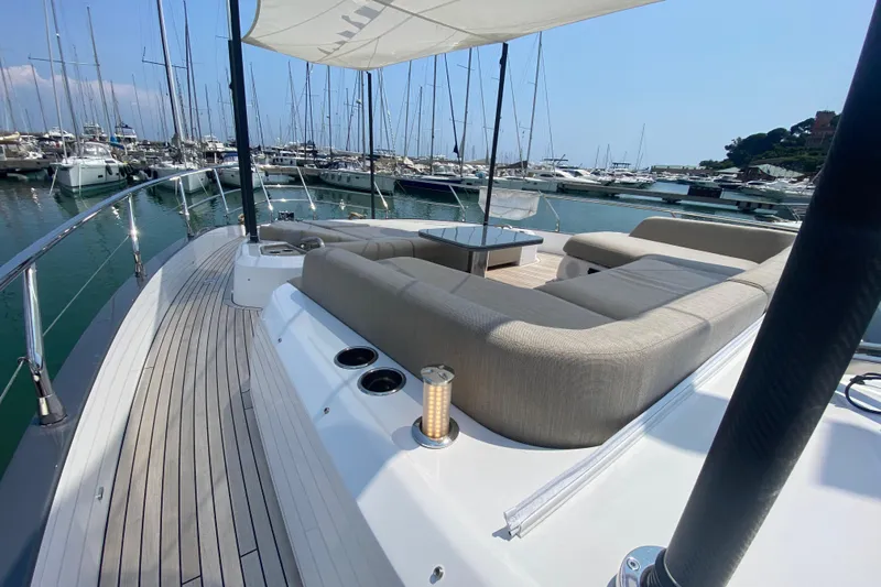  Yacht Photos Pics Luxurious 2023 Azimut S7 yacht with spacious deck and elegant seating in marina.