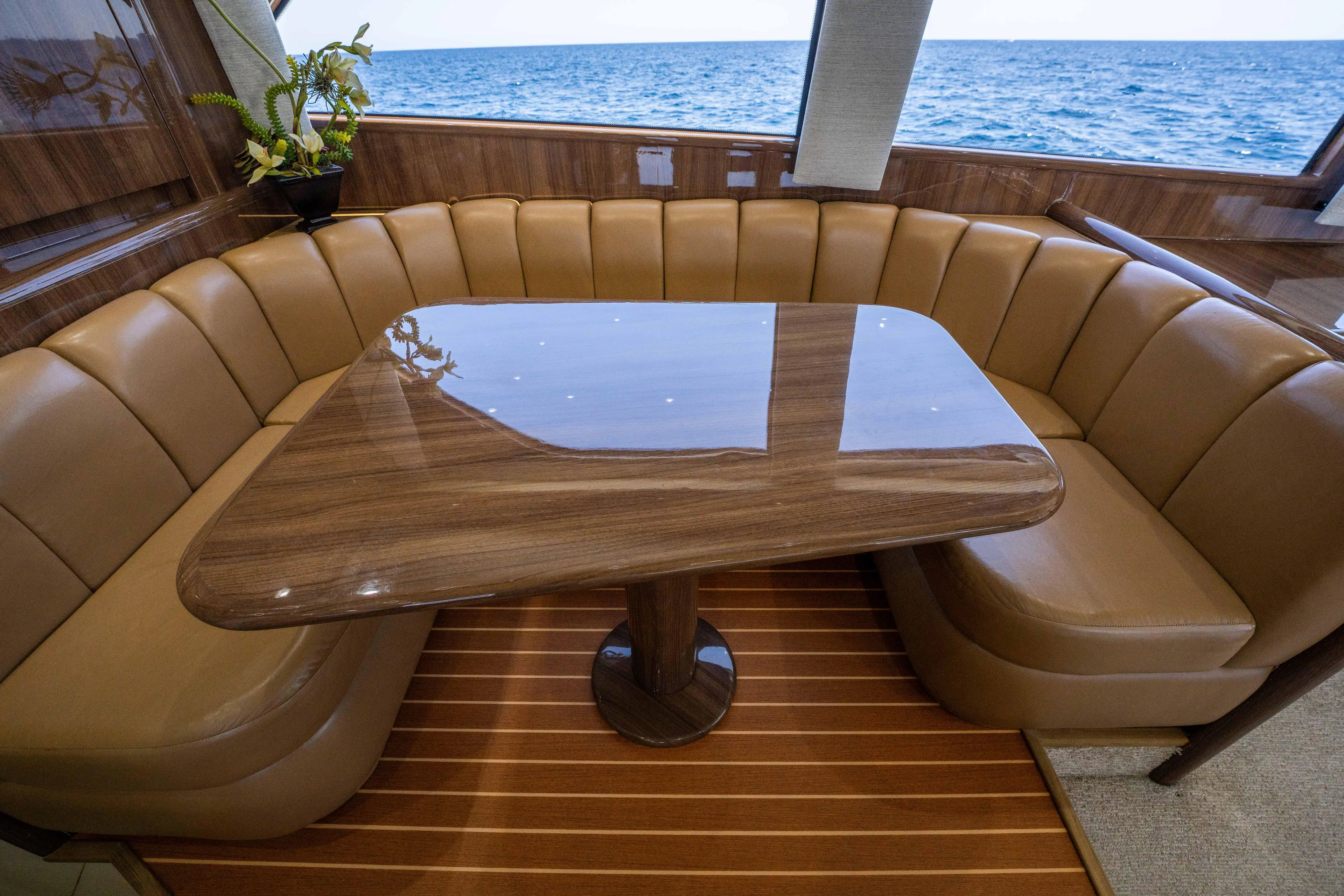 Santana Yacht Photos Pics Luxurious dining area on a 2003 Viking 65 Convertible yacht with ocean view.