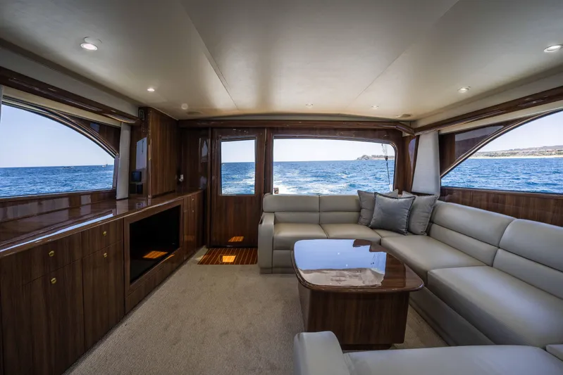 Santana Yacht Photos Pics Luxurious interior of a 2003 Viking 65 Convertible yacht with ocean view.