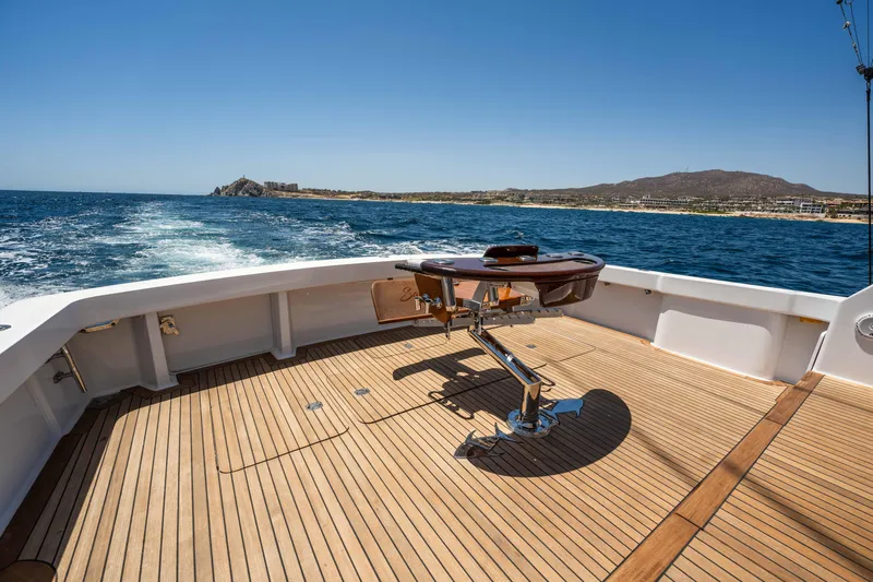 Santana Yacht Photos Pics 2003 Viking 65 Convertible yacht deck with ocean view and fishing chair.