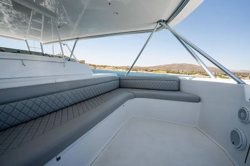 Santana Yacht Photos Pics Luxurious seating area on a 2003 Viking 65 Convertible yacht with scenic views.