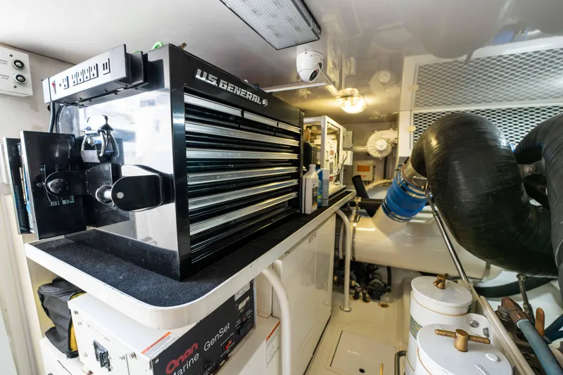 Santana Yacht Photos Pics Engine room of 2003 Viking 65 Convertible with tool chest and equipment.