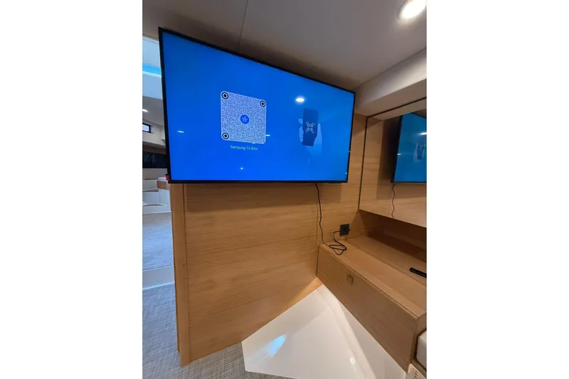  Yacht Photos Pics Modern interior of 2025 De Antonio Yachts D50 featuring a Samsung TV setup.