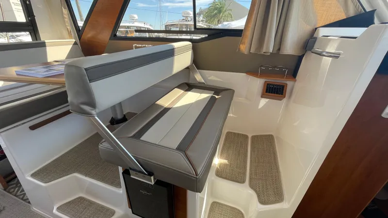  Yacht Photos Pics 2023 Cutwater C-288 interior with modern seating and sleek design elements.