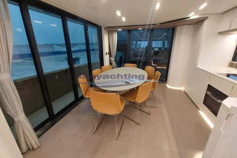  Yacht Photos Pics Luxurious interior of 2024 Pardo Endurance 72 yacht with modern dining area.