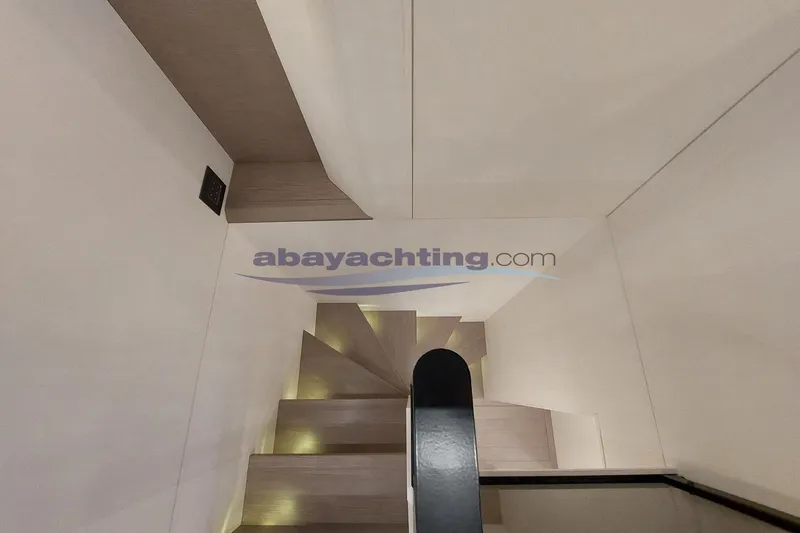  Yacht Photos Pics Staircase inside 2024 Pardo Endurance 72 yacht with modern design and ambient lighting.