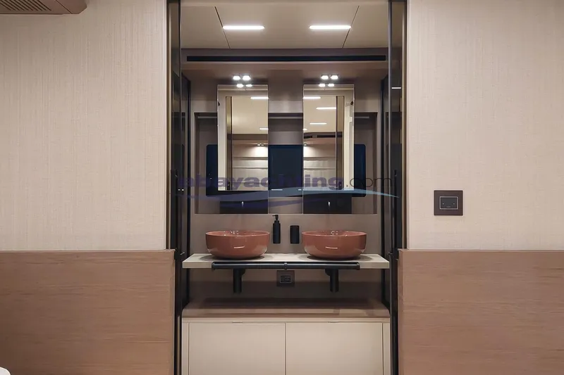  Yacht Photos Pics Luxurious bathroom interior of 2024 Pardo Endurance 72 yacht with dual sinks and modern design.