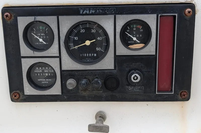 Thistle Yacht Photos Pics Control panel of a 2001 Tartan 3700 with gauges and switches.