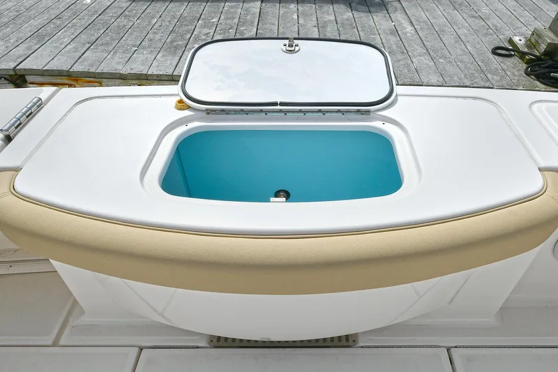 Lady A Yacht Photos Pics Livewell on 2017 Tiara Yachts 39 Convertible, open lid, blue interior, dock background.