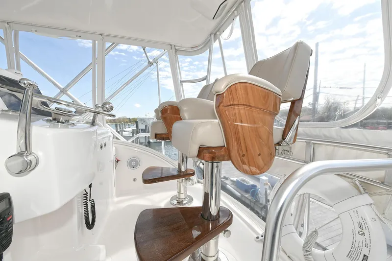 Lady A Yacht Photos Pics Interior of 2017 Tiara Yachts 39 Convertible with luxurious helm seating.