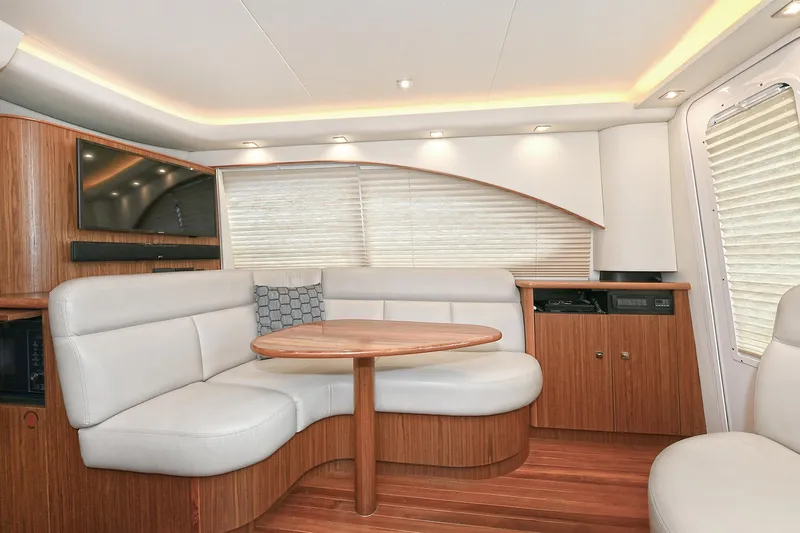 Lady A Yacht Photos Pics Luxurious interior of 2017 Tiara Yachts 39 Convertible with elegant seating and wood finishes.