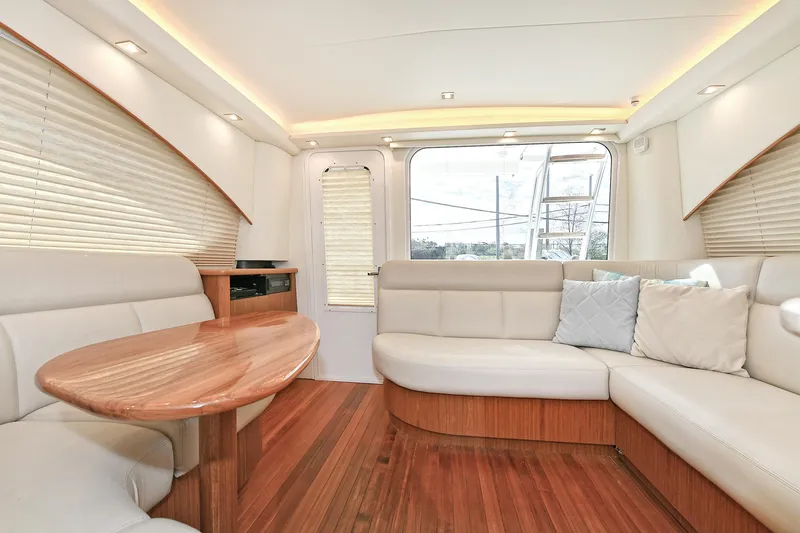Lady A Yacht Photos Pics Luxurious interior of 2017 Tiara Yachts 39 Convertible with elegant seating and wooden accents.