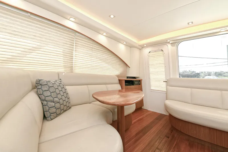 Lady A Yacht Photos Pics Luxurious interior of 2017 Tiara Yachts 39 Convertible with elegant seating and wooden accents.