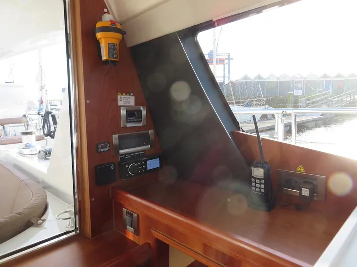  Yacht Photos Pics Navigation station on 2018 Moody 54 DS yacht with communication equipment.