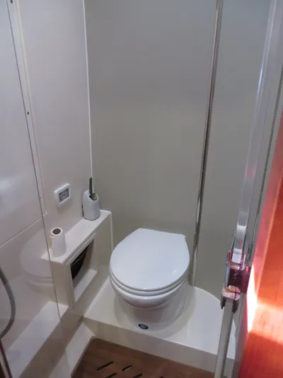  Yacht Photos Pics 2018 Moody 54 DS yacht bathroom with modern toilet and sleek design.