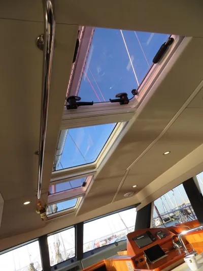  Yacht Photos Pics Interior view of 2018 Moody 54 DS yacht with skylights and modern design.