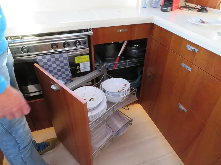  Yacht Photos Pics Modern kitchen in 2018 Moody 54 DS yacht with pull-out storage and stove.