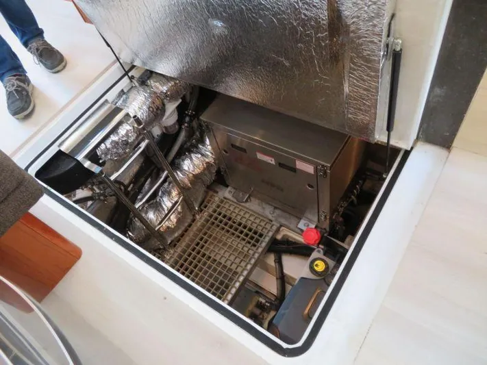  Yacht Photos Pics Engine compartment of 2018 Moody 54 DS yacht, showcasing mechanical components and insulation.