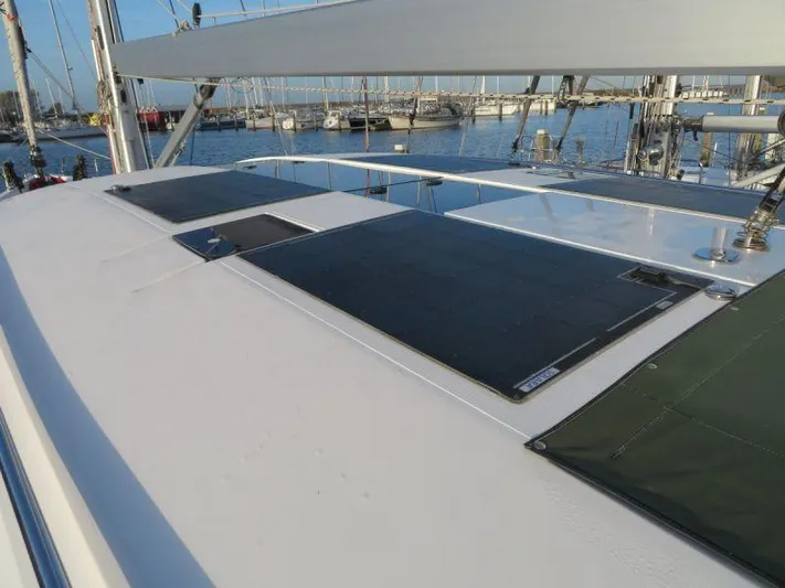  Yacht Photos Pics Sailing yacht Moody 54 DS 2018 with solar panels on deck in marina.
