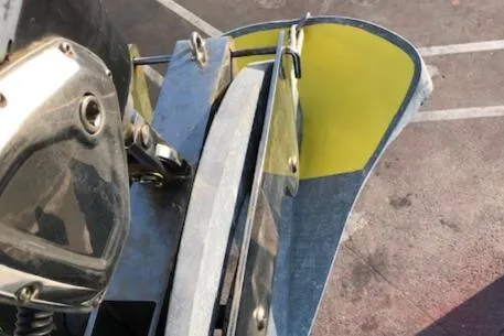  Yacht Photos Pics Close-up of a 2018 Moody 54 DS yacht's anchor mechanism on deck.