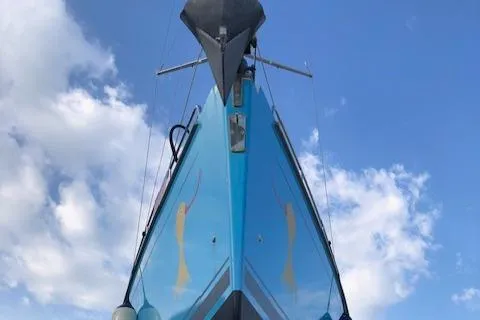  Yacht Photos Pics Moody 54 DS sailboat, 2018 model, viewed from below against a blue sky.