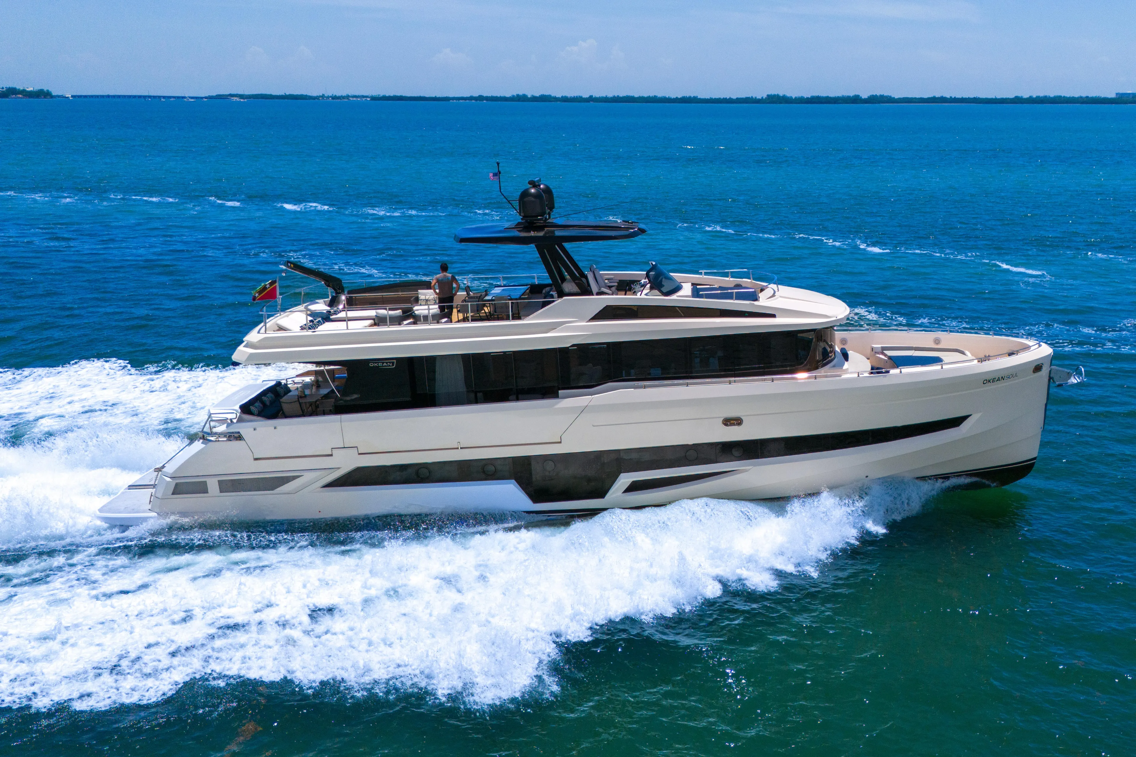  Yacht Photos Pics Luxury 2021 OKEAN 80 yacht cruising on blue ocean waters.