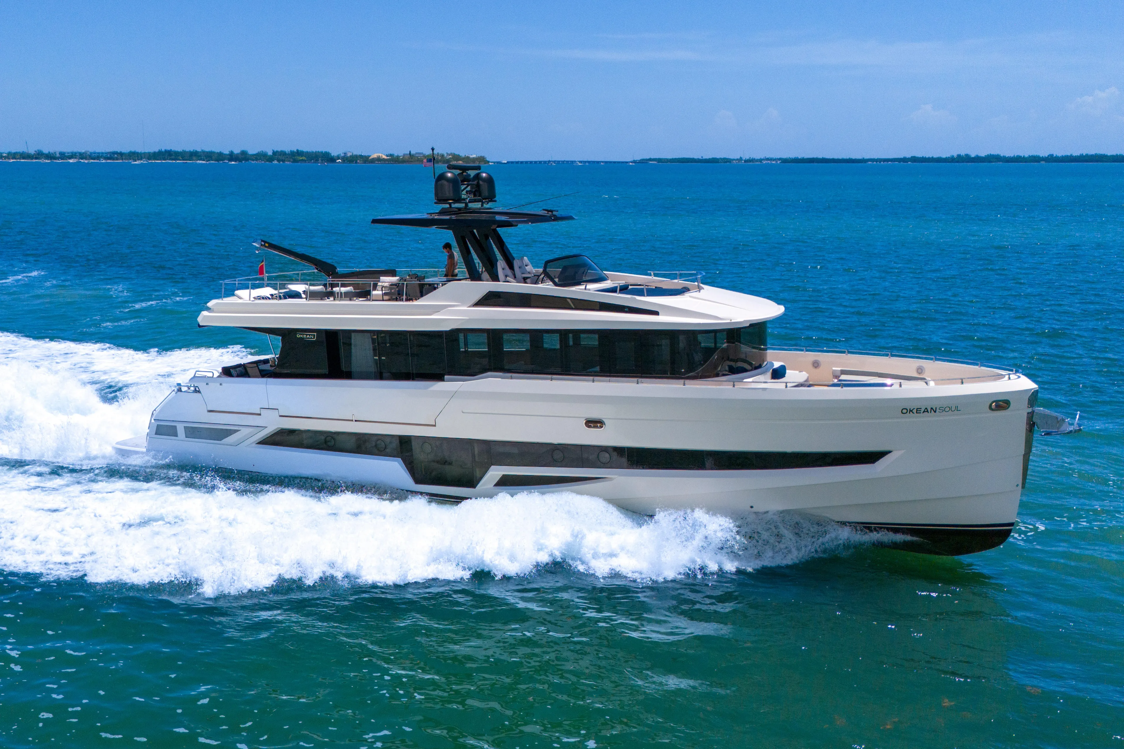  Yacht Photos Pics Luxury 2021 OKEAN 80 yacht cruising on blue ocean waters.