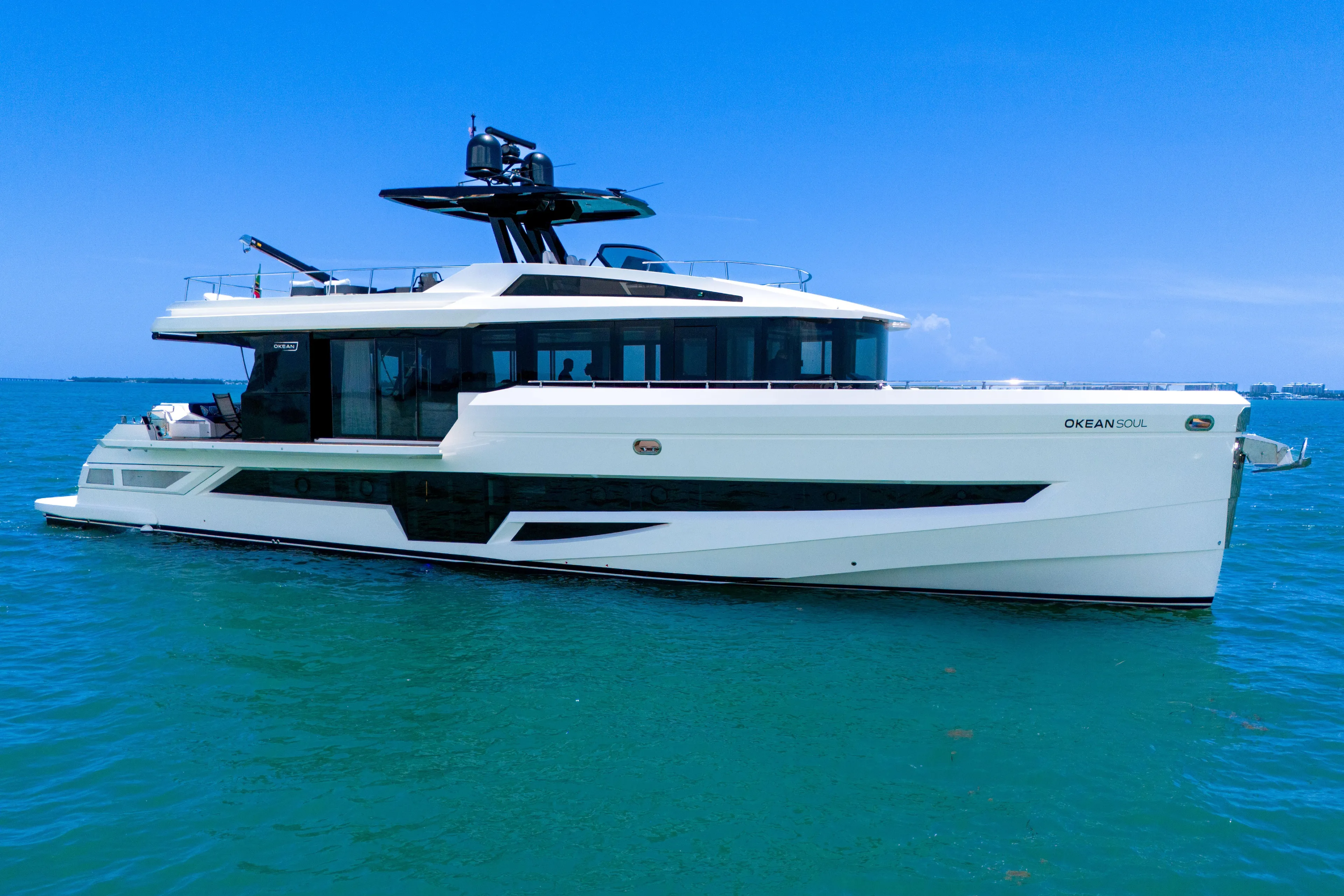  Yacht Photos Pics Luxury 2021 OKEAN 80 yacht on clear blue ocean waters.