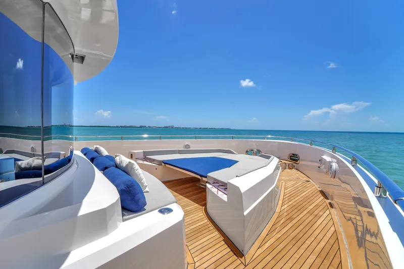  Yacht Photos Pics Luxurious 2021 OKEAN 80 yacht deck with ocean view and plush seating.