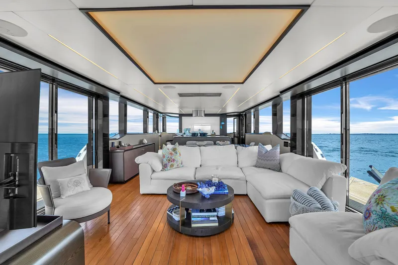  Yacht Photos Pics Luxurious interior of 2021 OKEAN 80 yacht with ocean view, featuring elegant seating and modern design.